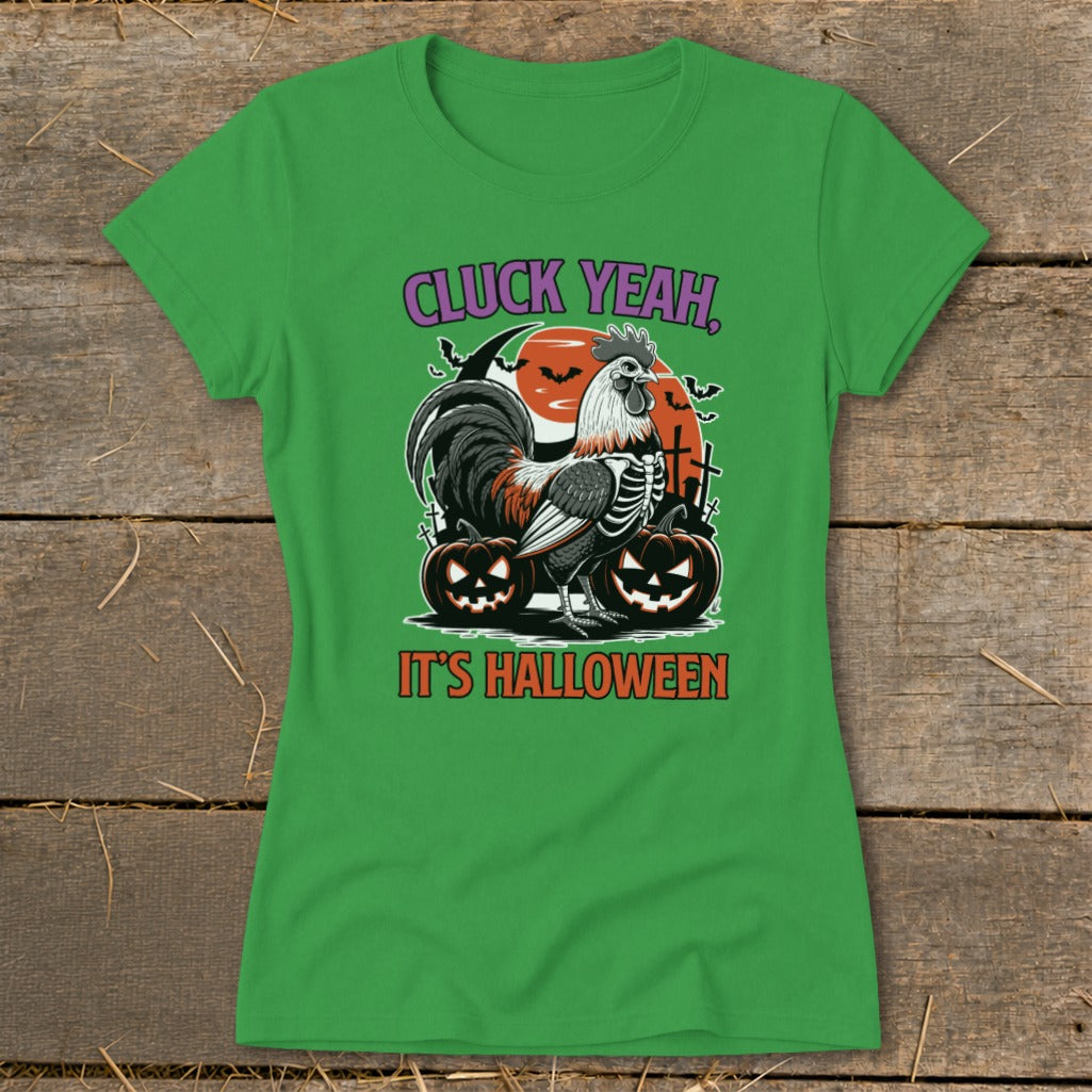 Green t-shirt with skeleton rooster, pumpkins, moon, and text "CLUCK YEAH, IT'S HALLOWEEN".
