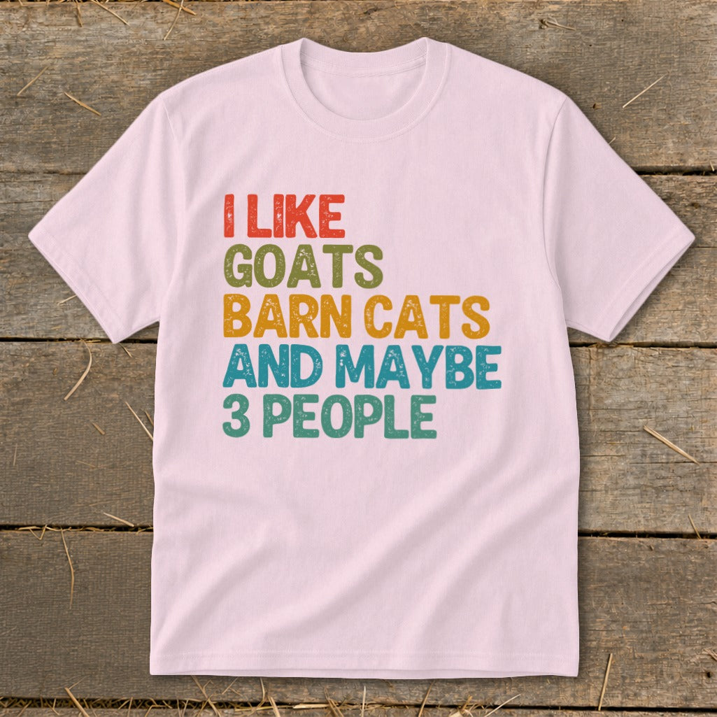 Pink t-shirt with text "I LIKE GOATS BARN CATS AND MAYBE 3 PEOPLE".