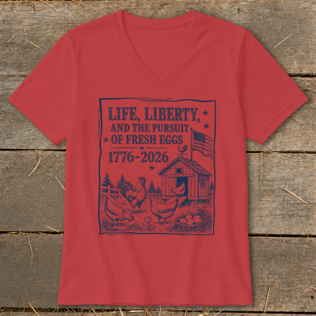 Red v-neck t-shirt with "Life, Liberty, and the Pursuit of Fresh Eggs" graphic.