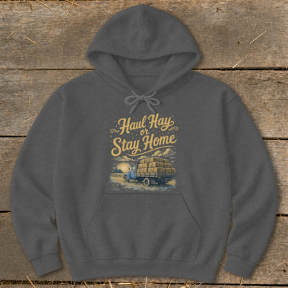 Dark gray hoodie with "Haul Hay or Stay Home" text and a truck with hay bales.
