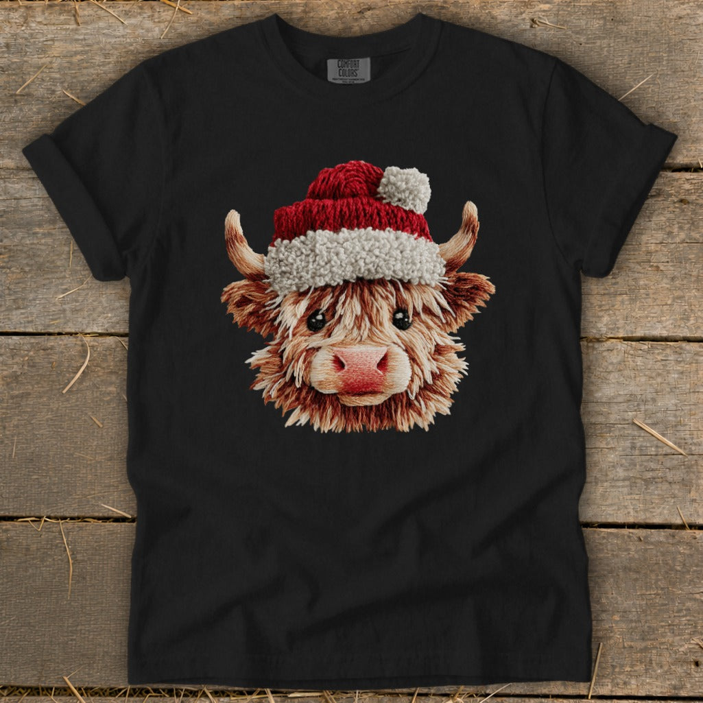 Black t-shirt with embroidered Highland cow wearing a Santa hat.