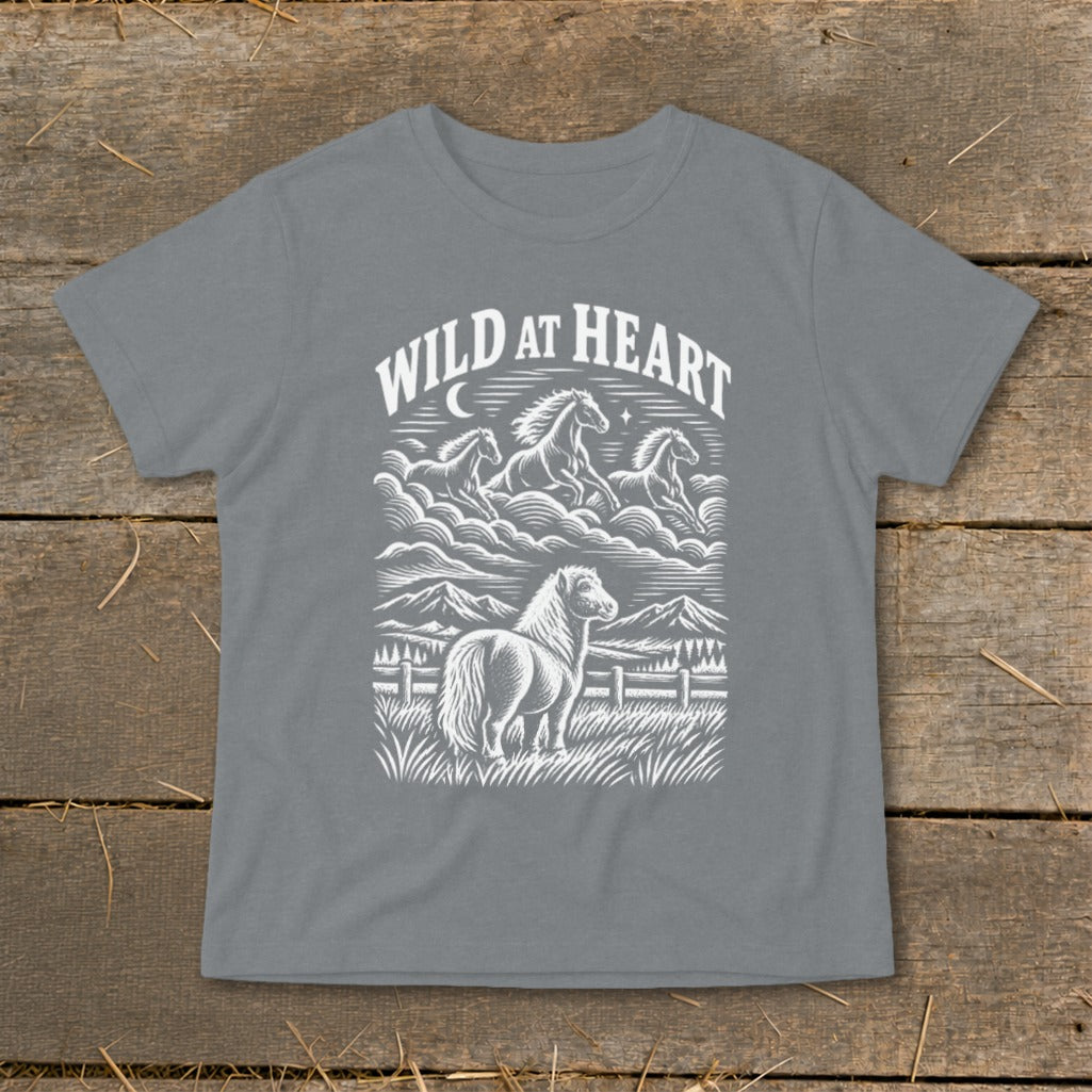 Grey t-shirt with a white linework graphic of horses and mountains and text "WILD AT HEART".