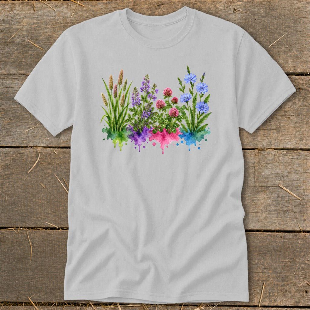 A light gray crewneck t-shirt featuring a colorful botanical watercolor graphic of wildflowers and grasses across the chest.