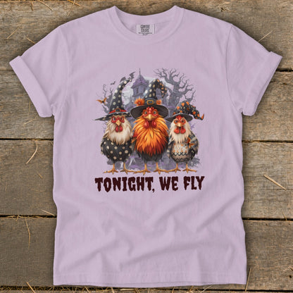 Three chickens in witch hats with "TONIGHT, WE FLY" text.