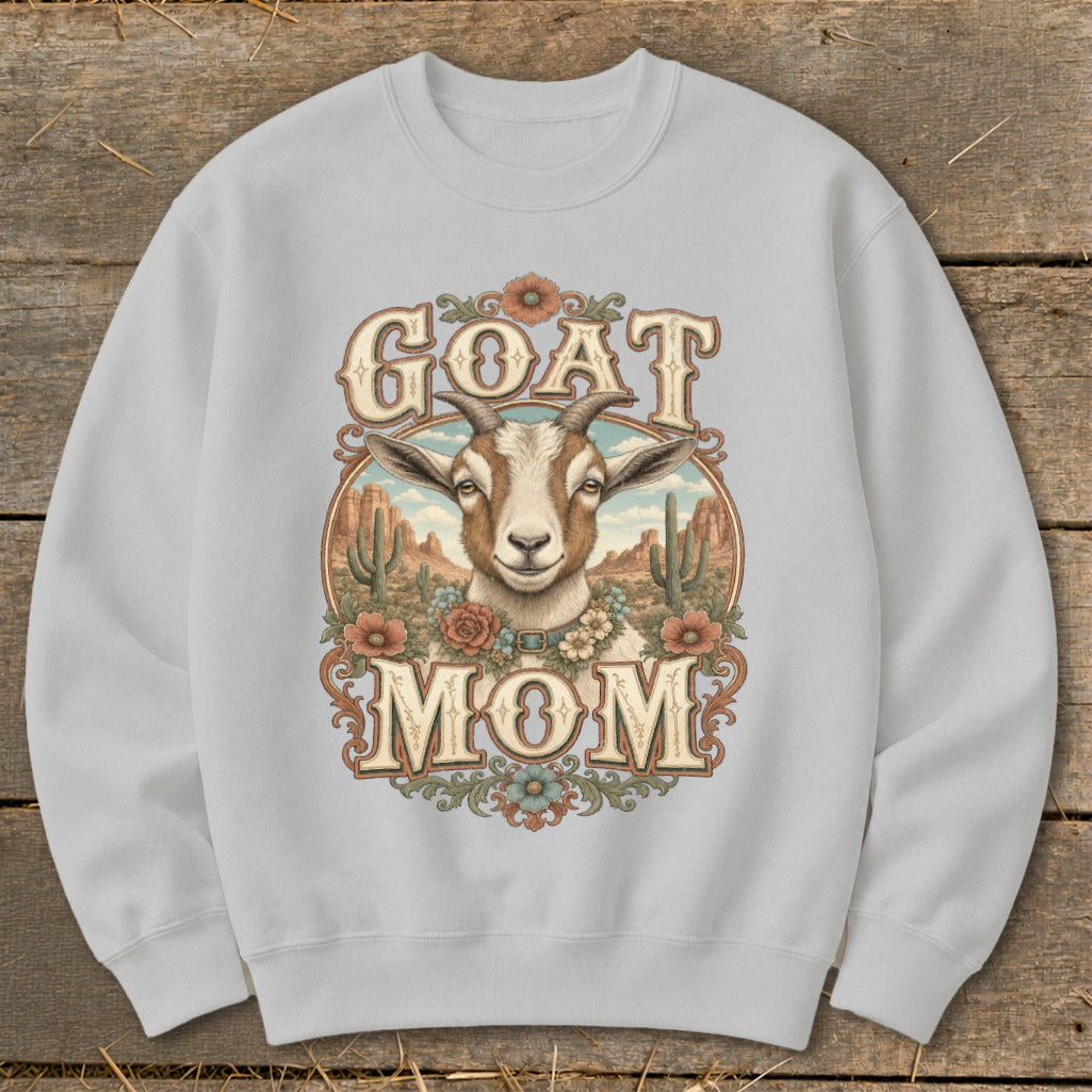 Light grey sweatshirt with "GOAT MOM" text and goat illustration in desert scene.