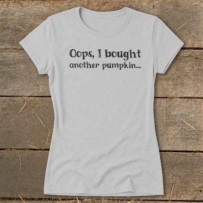 Light grey t-shirt with black text that reads "Oops, I bought another pumpkin..."
