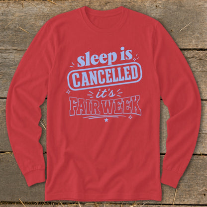 Red long sleeve shirt with "sleep is CANCELLED it's FAIR WEEK" text.