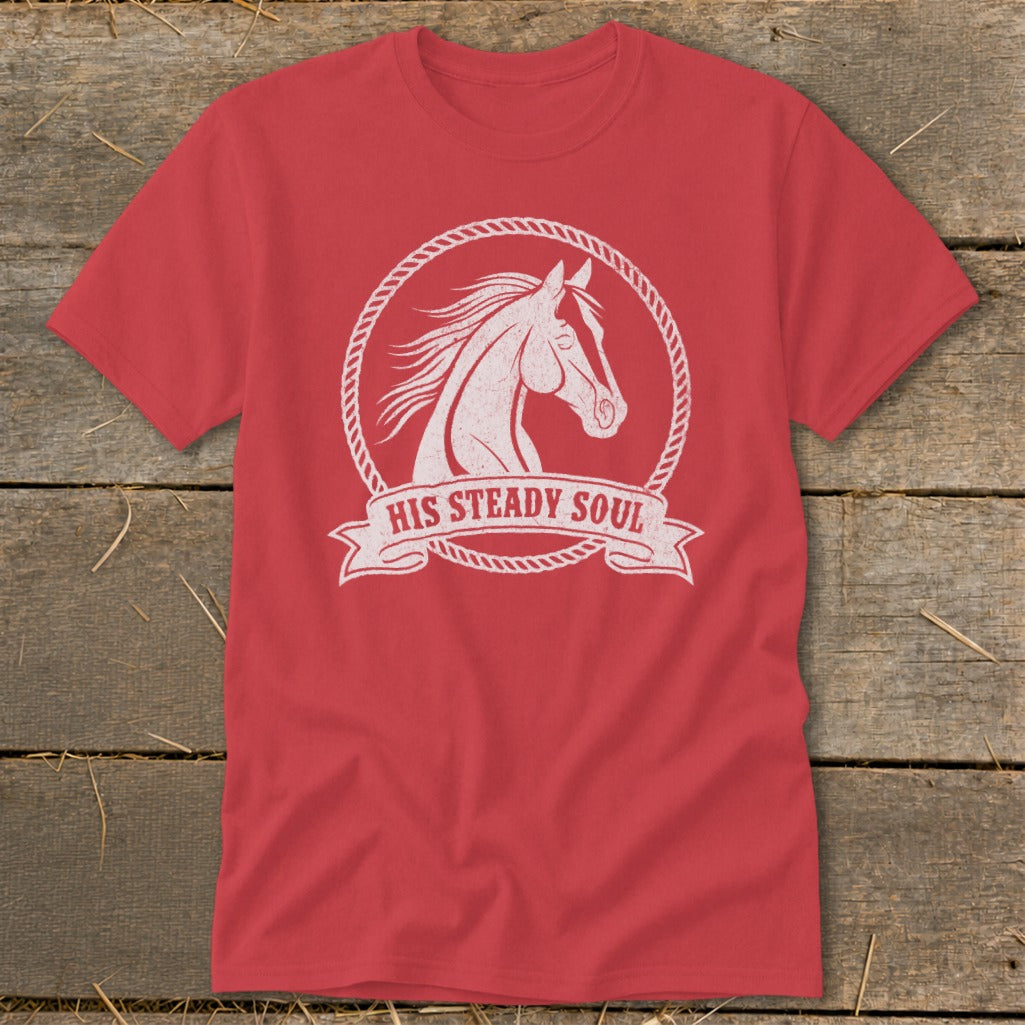 Red t-shirt with white distressed horse graphic inside a rope circle and banner reading "HIS STEADY SOUL".