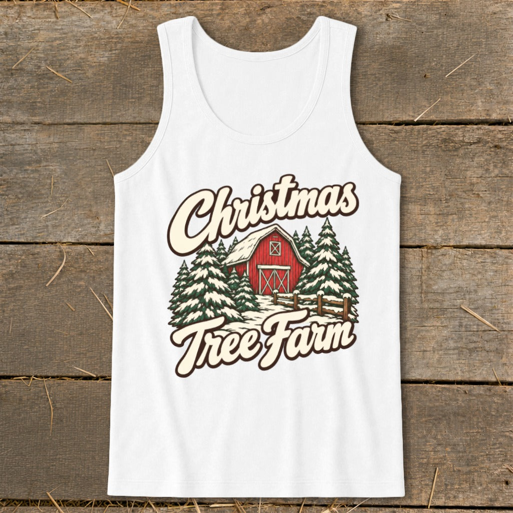 White tank top with Christmas Tree Farm design featuring a red barn and snowy trees.