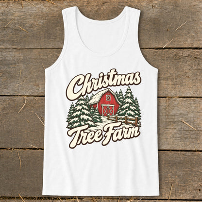 White tank top with Christmas Tree Farm design featuring a red barn and snowy trees.