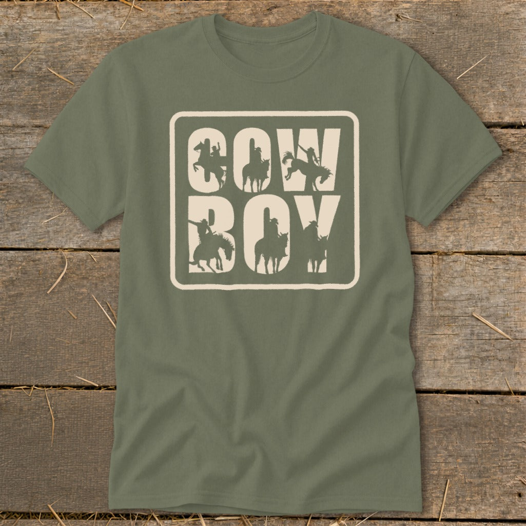 Olive t-shirt with "COWBOY" text and cowboy silhouettes within outlined boxes.
