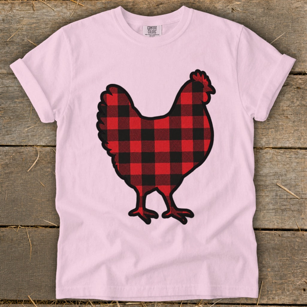 Pink t-shirt with a red and black buffalo plaid chicken graphic.