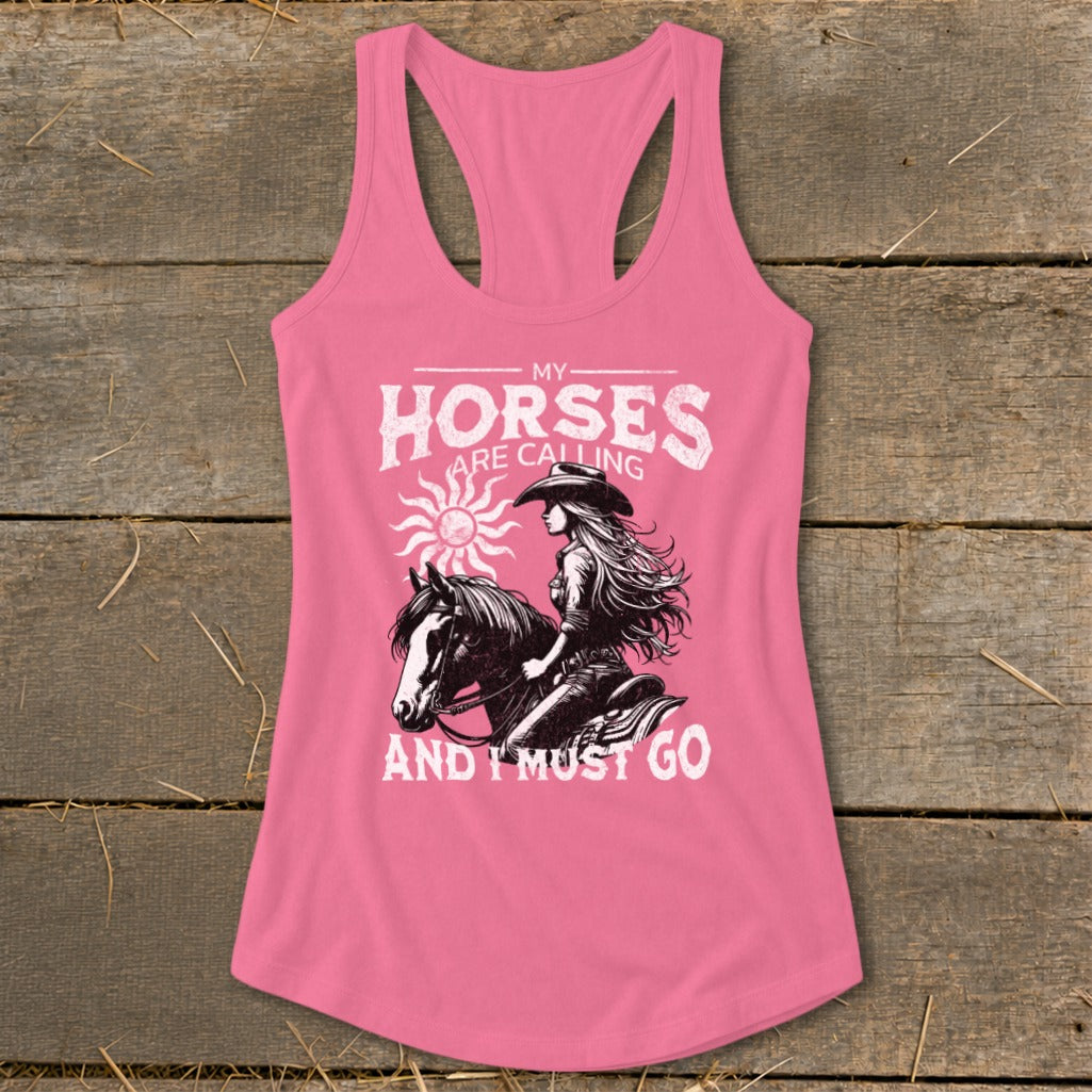 Pink tank top with "My Horses Are Calling And I Must Go" and woman on horse graphic.