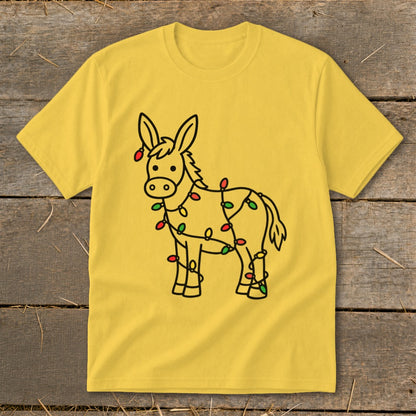 Yellow t-shirt with a cartoon donkey wrapped in red and green Christmas lights.