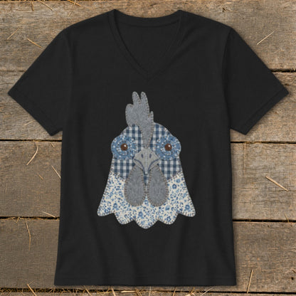 Black v-neck t-shirt with a folk art fabric chicken face graphic.