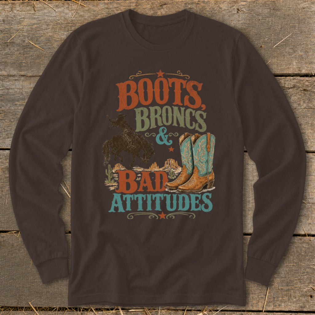 Brown long-sleeve shirt with "Boots Broncs & Bad Attitudes" rodeo graphic.