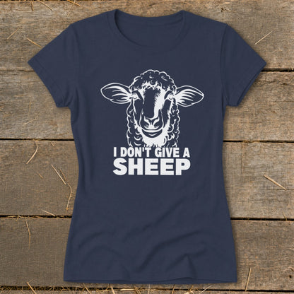 Navy t-shirt with white graphic of a sheep and text that reads "I DON'T GIVE A SHEEP".