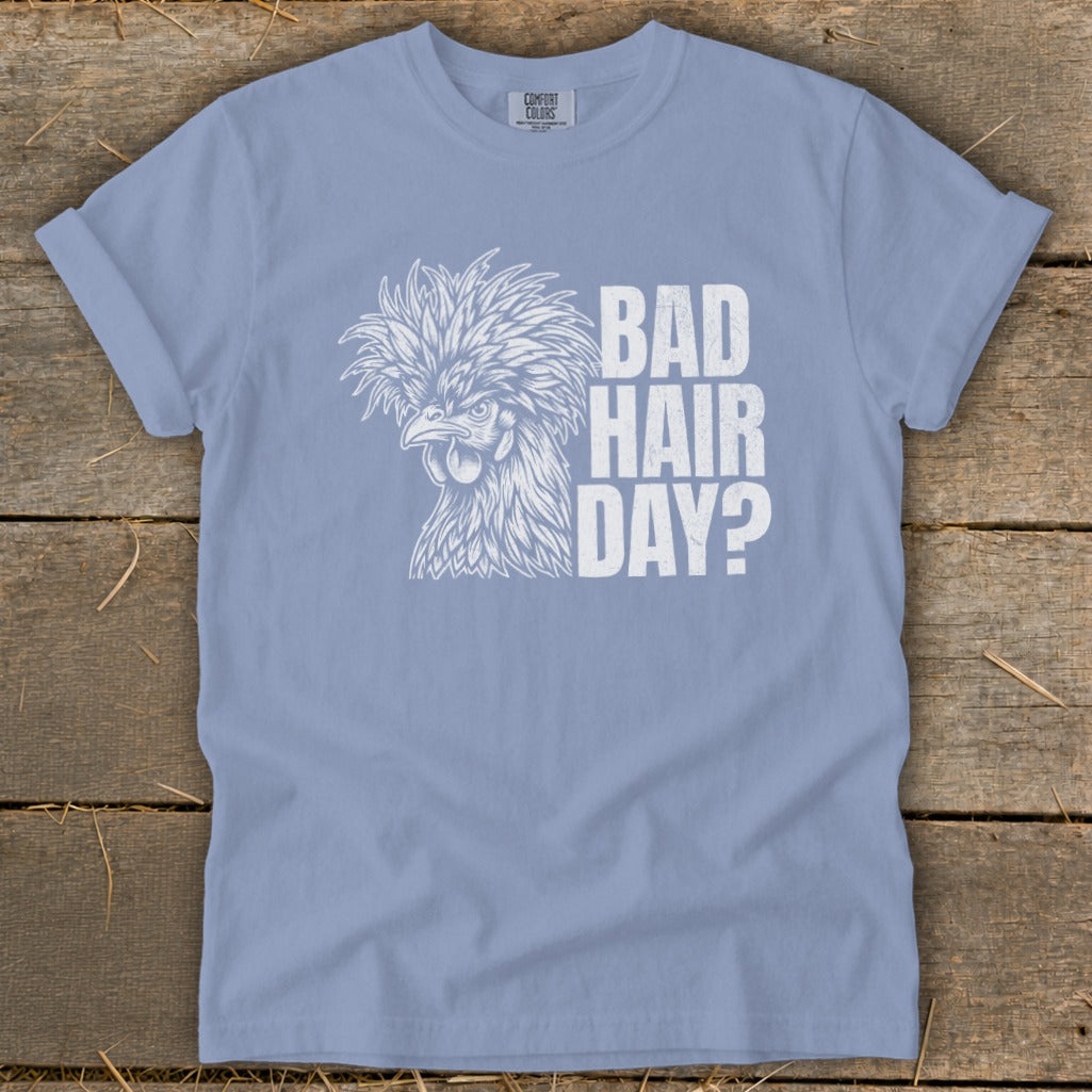 Light blue t-shirt with white graphic of a fluffy chicken and text "BAD HAIR DAY?".