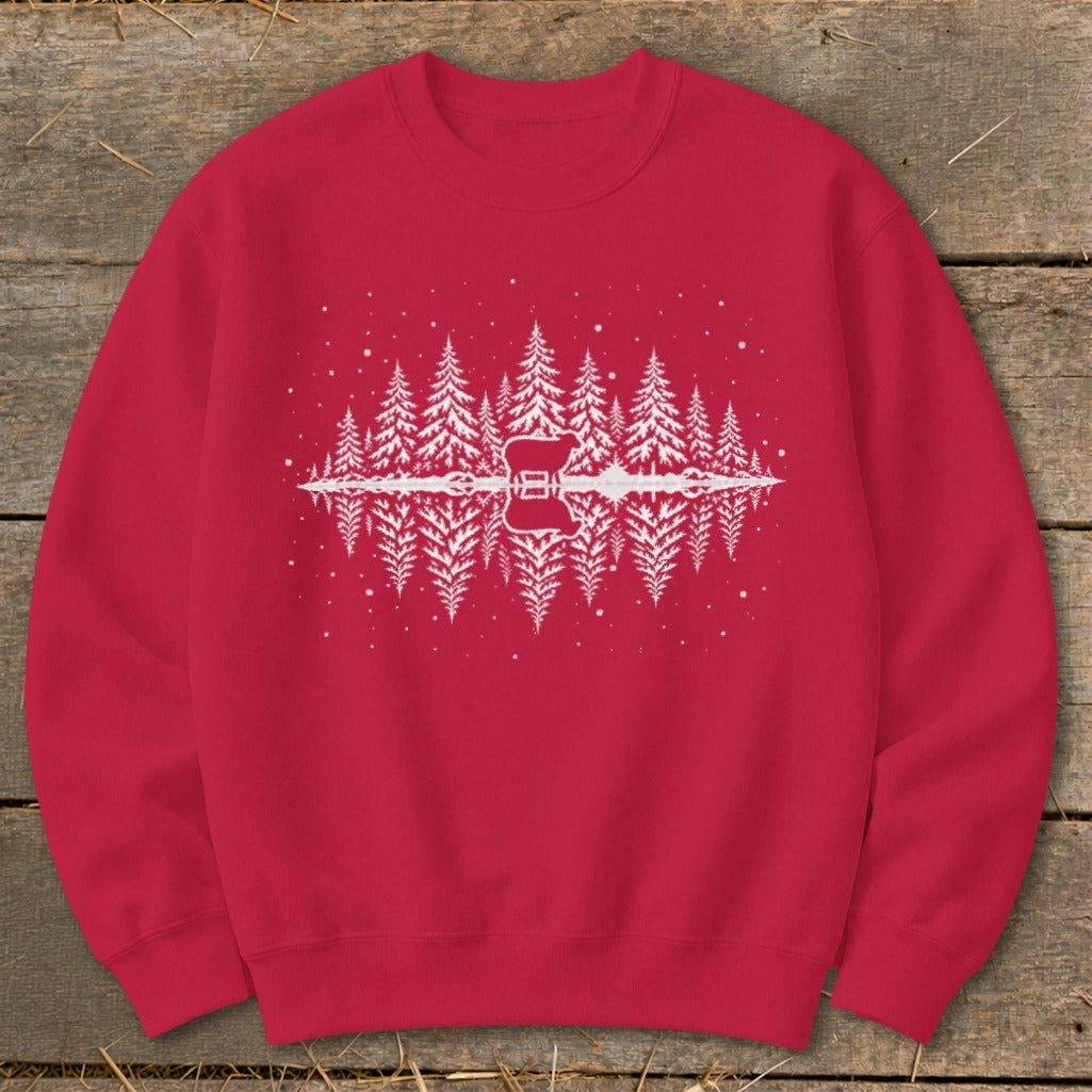 Red sweatshirt with a white graphic of pine trees, a sheep, and a guitar reflected in water.