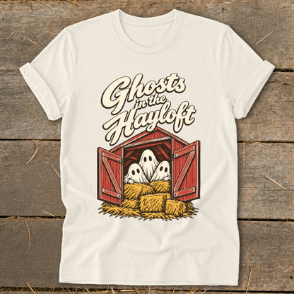 Ghosts in the Hayloft graphic on a cream t-shirt with three ghosts in a barn.