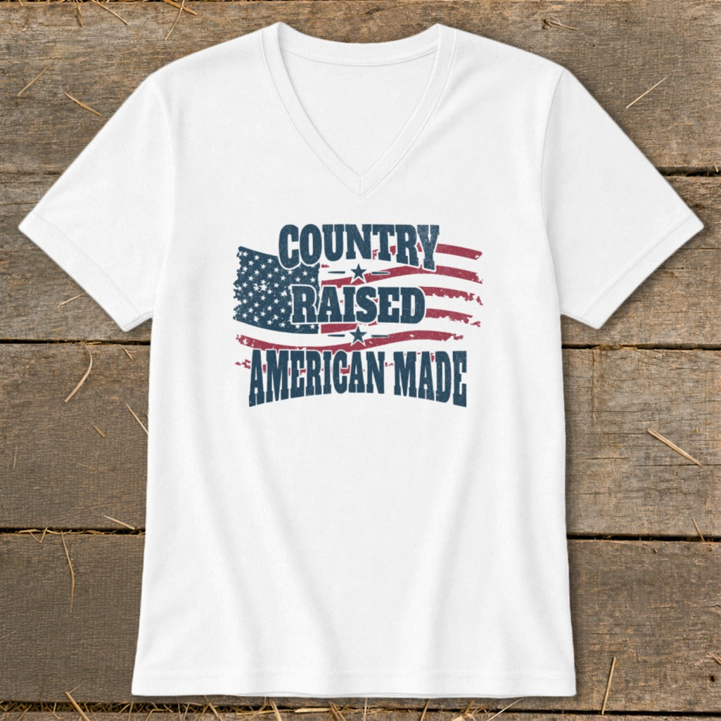 White t-shirt with distressed American flag graphic and text "Country Raised American Made".