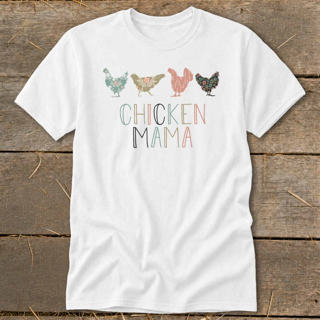 White t-shirt with "CHICKEN MAMA" text and four floral chickens.