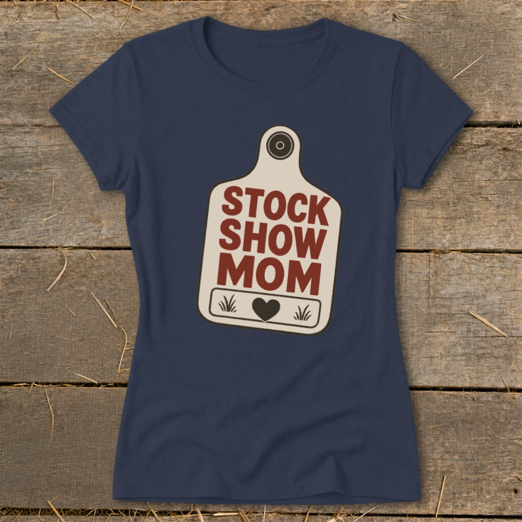 Navy t-shirt with "STOCK SHOW MOM" text on a tag graphic.