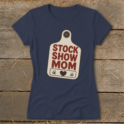 Navy t-shirt with "STOCK SHOW MOM" text on a tag graphic.