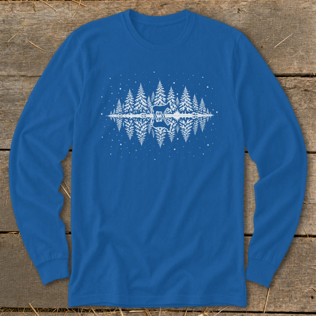 Blue long-sleeve shirt with a white graphic of a forest and deer reflected in water.