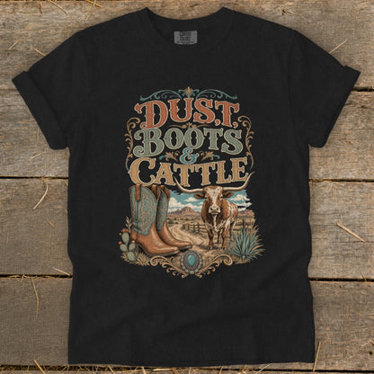 Black t-shirt with "Dust, Boots & Cattle" graphic featuring cowboy boots and a longhorn steer.