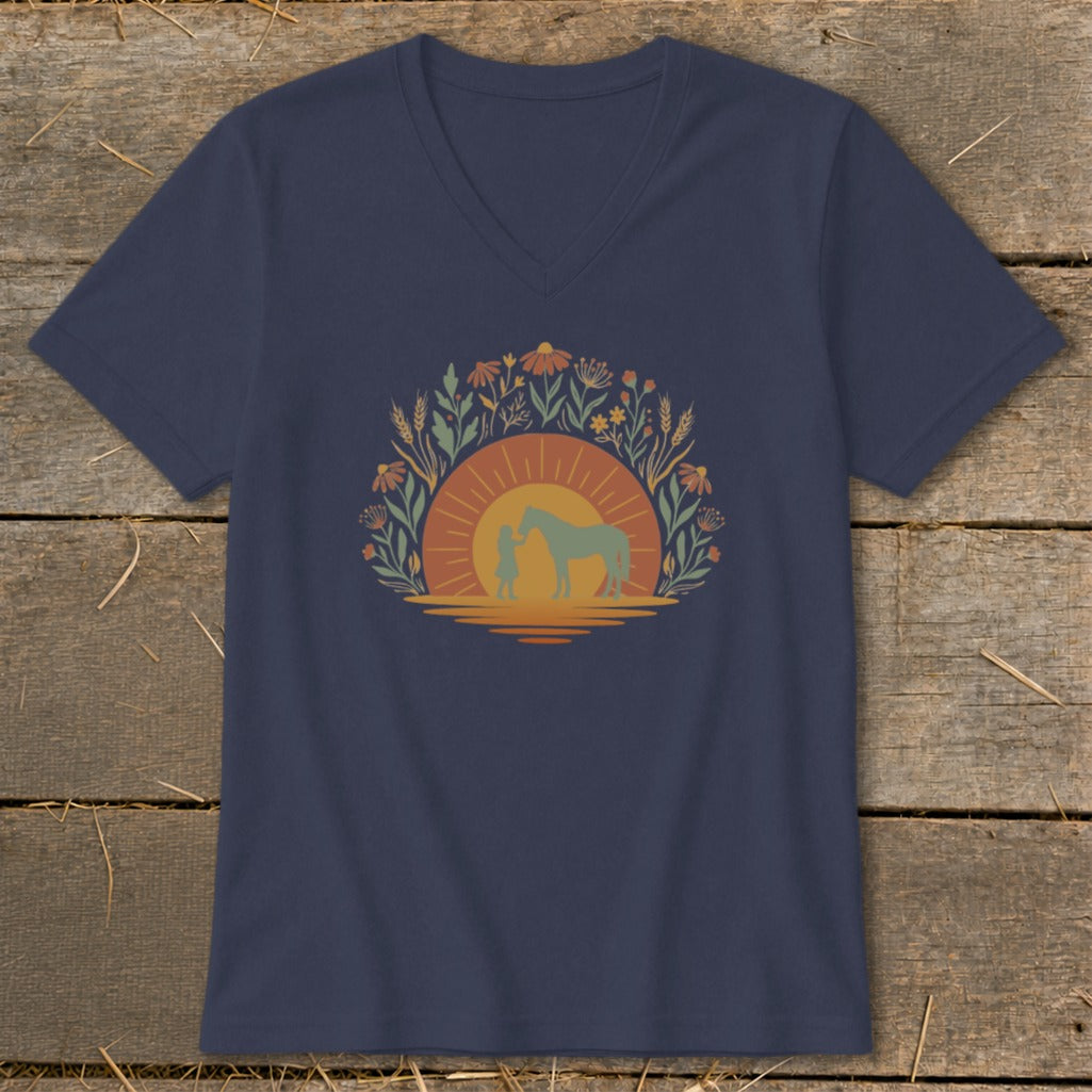 Navy v-neck t-shirt with girl and horse silhouette design at sunset.