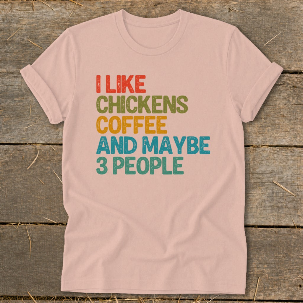 Pink t-shirt with text: I LIKE CHICKENS COFFEE AND MAYBE 3 PEOPLE