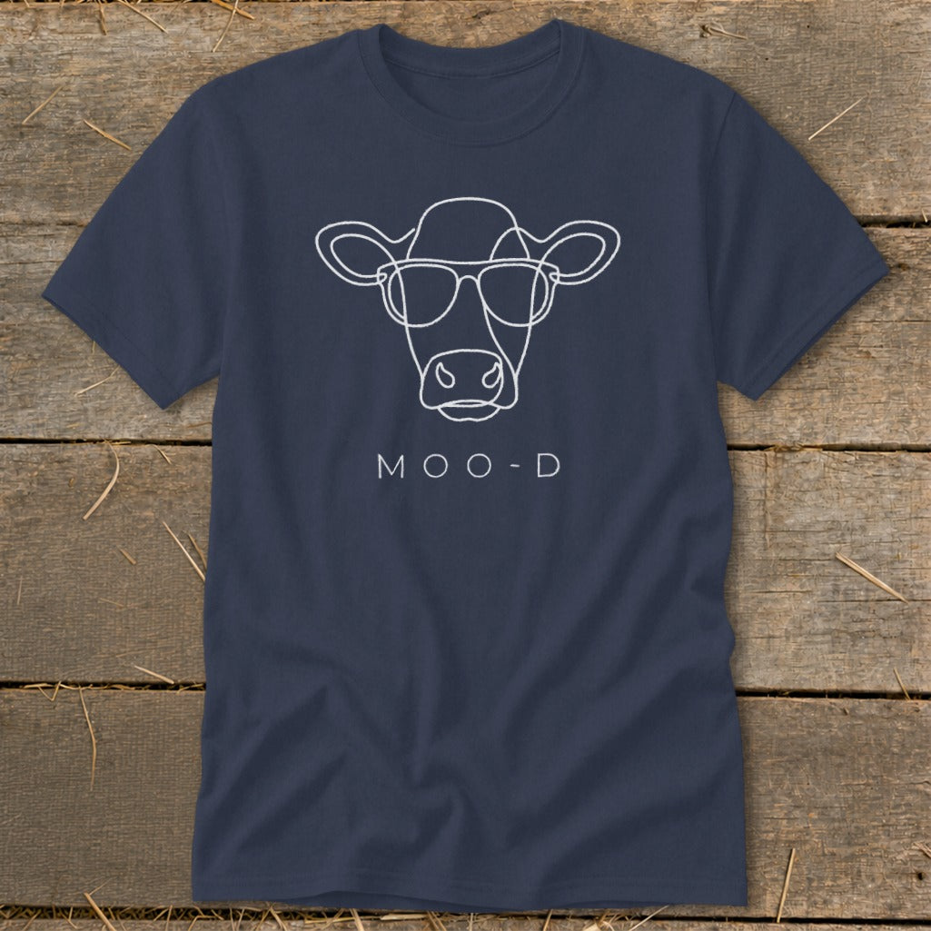 Navy t-shirt with a white line drawing of a cow wearing glasses and the text "MOO-D".