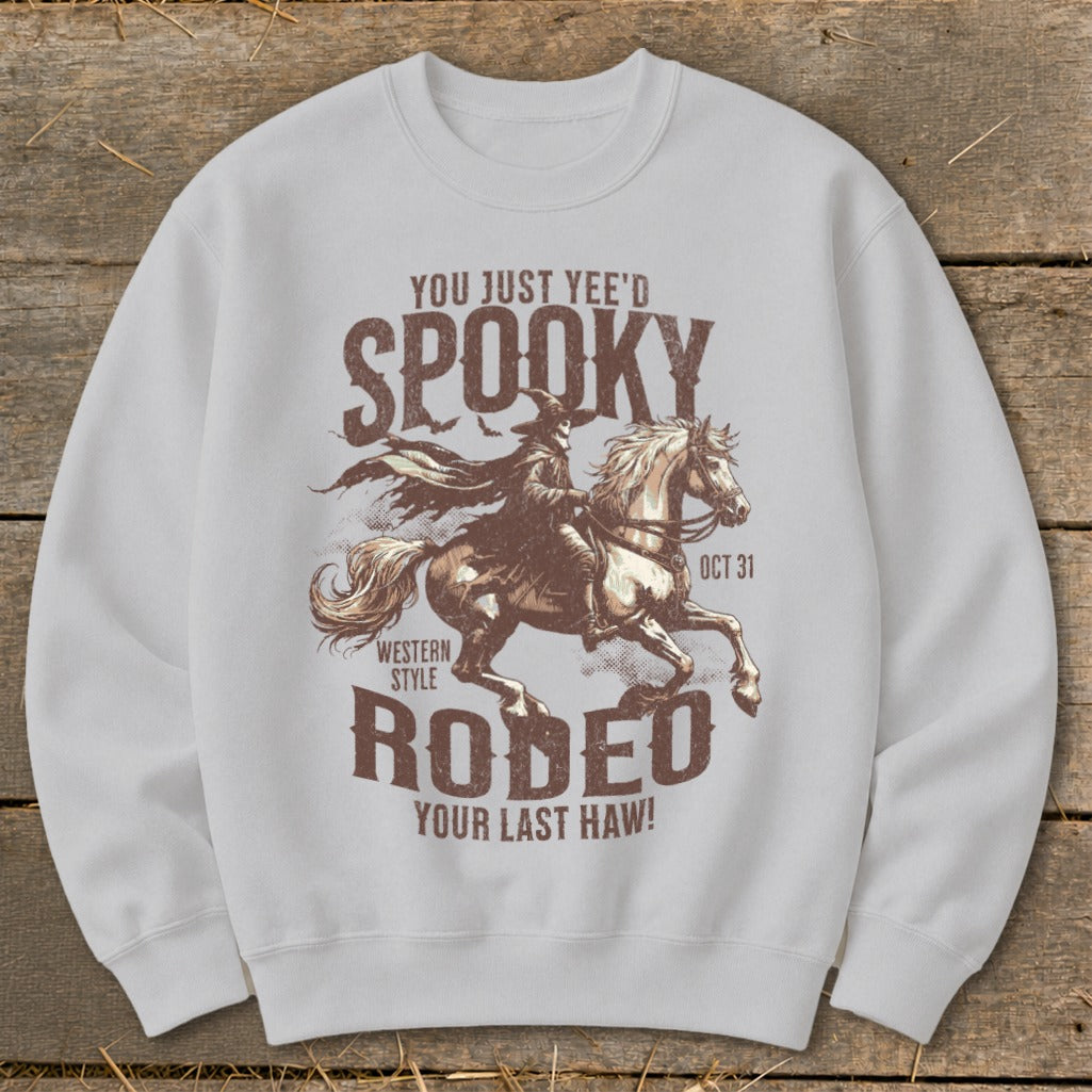 Spooky Rodeo graphic on a white sweatshirt with text: "You Just Yee'd Spooky Rodeo Your Last Haw!"