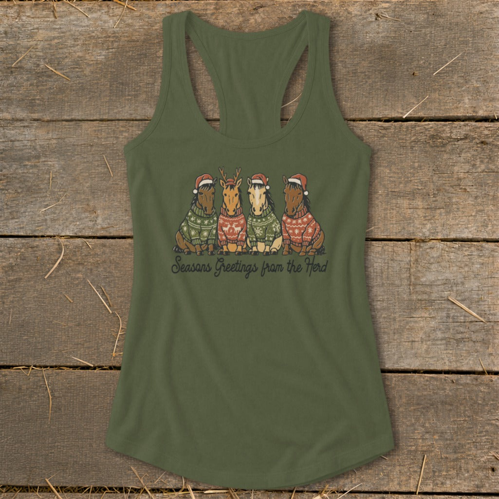 Four horses wearing Santa hats and sweaters, with text "Seasons Greetings from the Herd".
