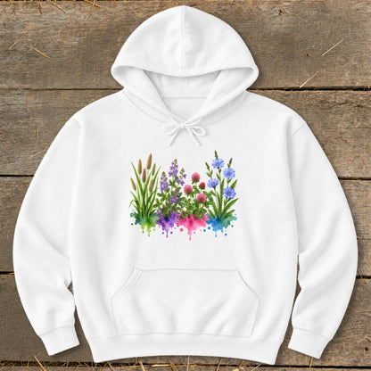 A white hooded sweatshirt featuring a colorful watercolor illustration of wildflowers centered on the chest.