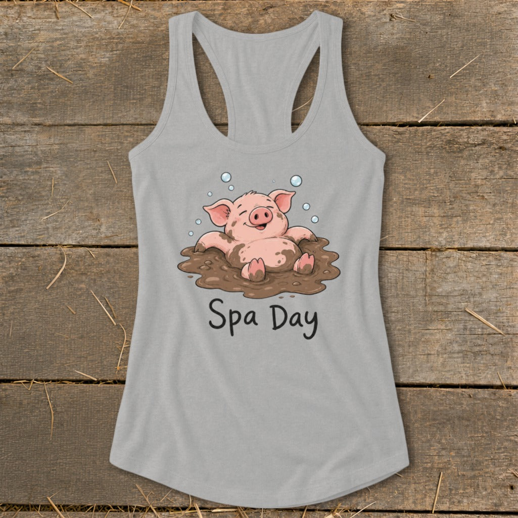 Tank top with a cartoon pig enjoying a mud bath, text reads "Spa Day".