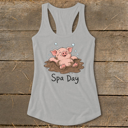 Tank top with a cartoon pig enjoying a mud bath, text reads "Spa Day".