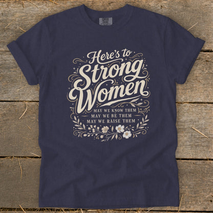 Navy t-shirt with "Here's to Strong Women" text and floral design.