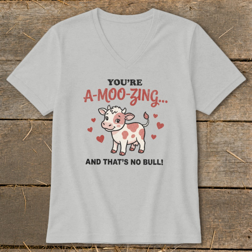 Light gray t-shirt with a cartoon cow and text: "You're A-moo-zing... And That's No Bull!"