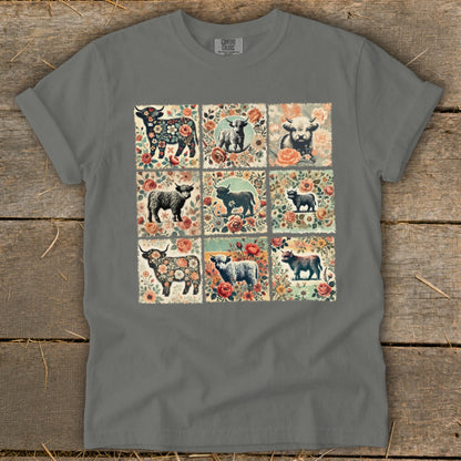 T-shirt with nine floral postage stamp-style squares featuring Highland cows.