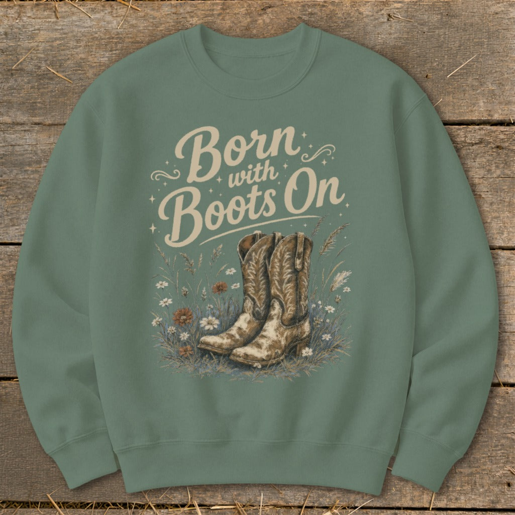 Green sweatshirt with "Born with Boots On" text and cowboy boots in flowers.