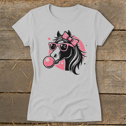 Horse head with pink bow, sunglasses, and bubblegum on a light gray t-shirt.