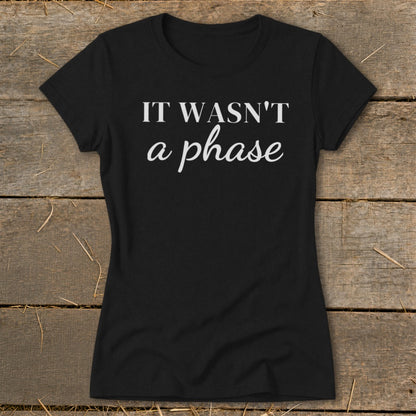 Black t-shirt with white text that reads "IT WASN'T a phase".
