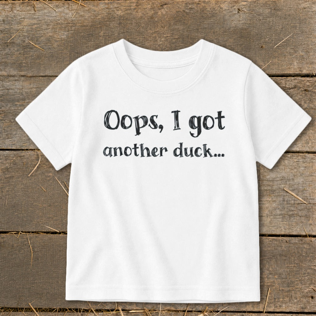 White t-shirt with black text that reads "Oops, I got another duck..."
