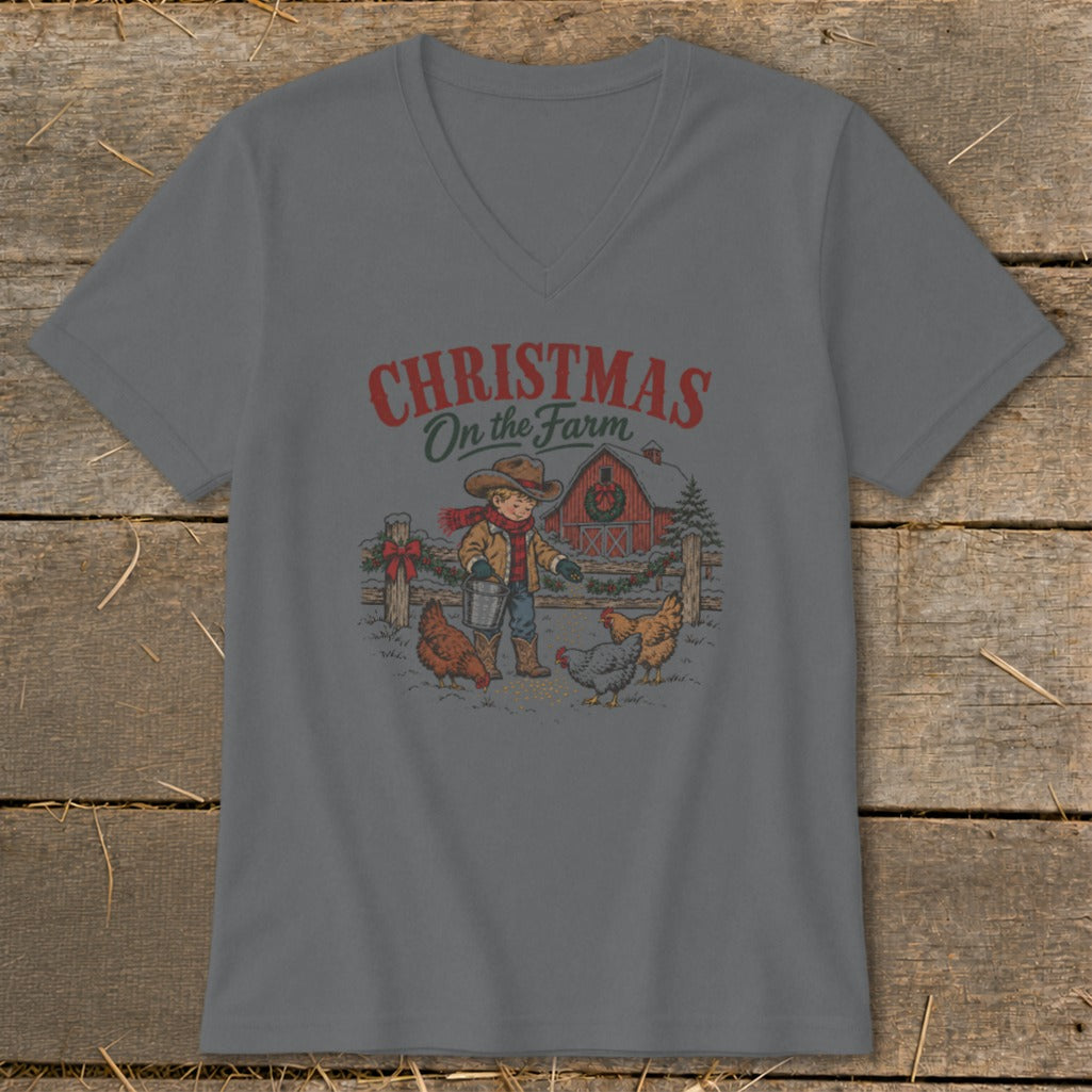 Christmas on the Farm graphic with boy feeding chickens in front of a barn.