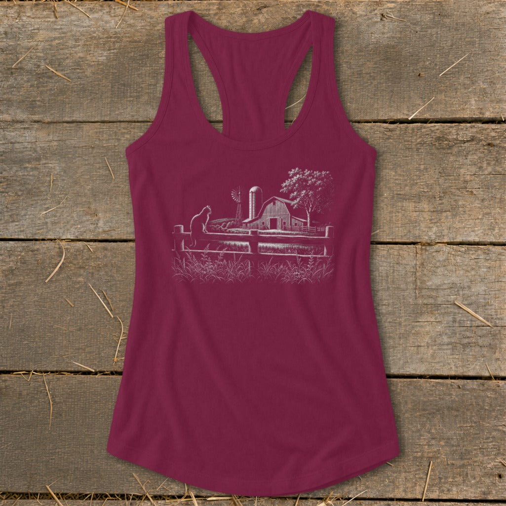 Maroon tank top with a white line drawing of a barn, windmill, and cat on a fence.
