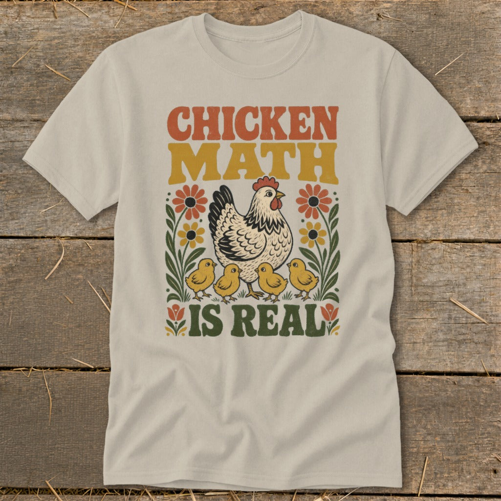 Cream t-shirt with retro "Chicken Math is Real" graphic and hen with chicks.