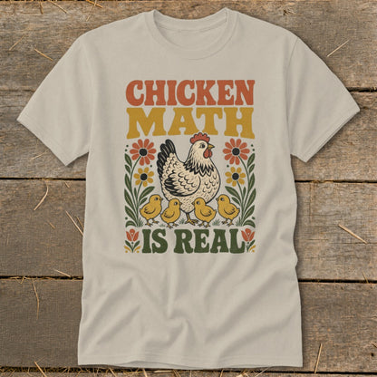 Cream t-shirt with retro "Chicken Math is Real" graphic and hen with chicks.