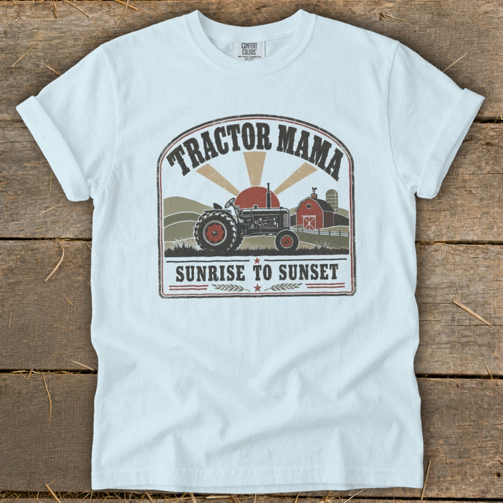 Tractor Mama Sunrise to Sunset graphic on a white t-shirt with farm scene.